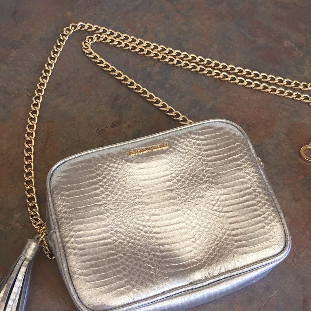 Crossbody silver with tassel + pink fur charm